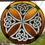 Celtic cross in green and gold